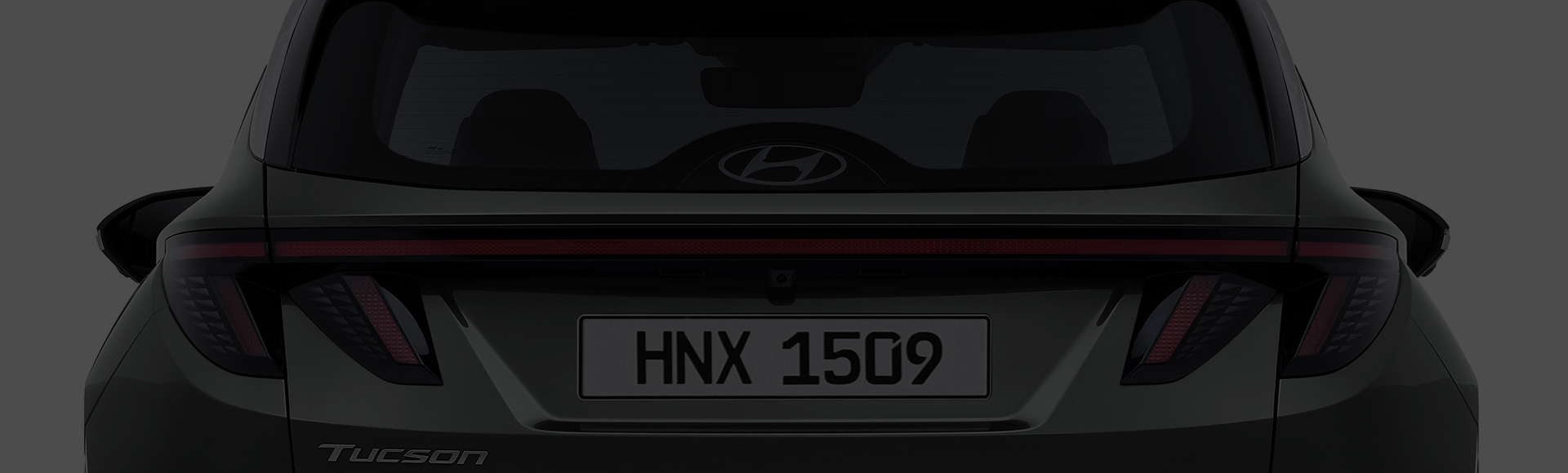 Closer view at the front part of Hyundai car with its logo and grille